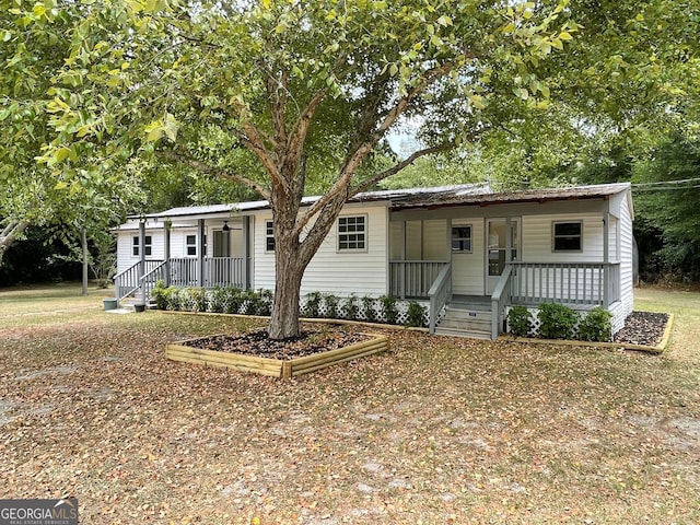 manufactured / mobile home with a porch