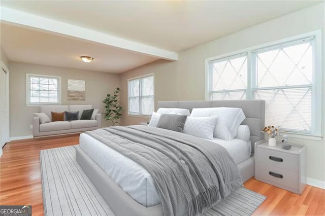 bedroom with light wood-type flooring