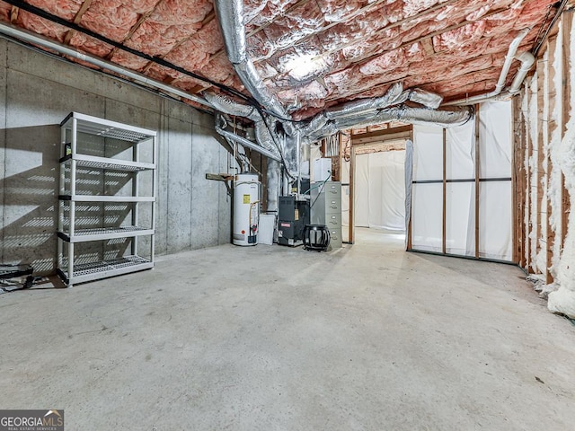 basement with gas water heater and heating unit