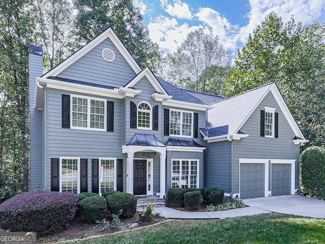 view of front of property with a garage