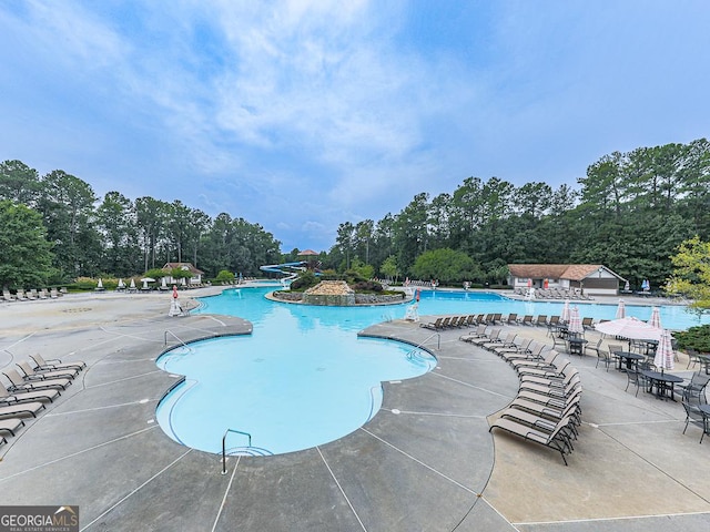 view of pool featuring a patio area