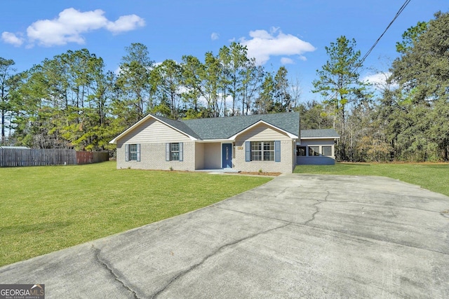 single story home with a front yard