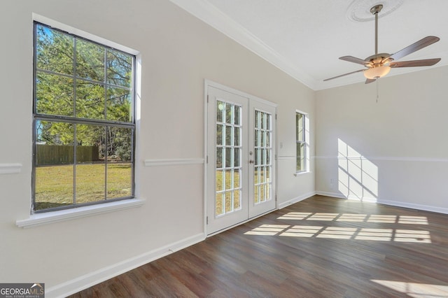 interior space featuring french doors, dark hardwood / wood-style floors, ceiling fan, and ornamental molding