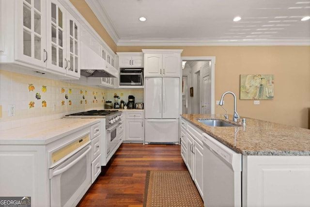 kitchen featuring white cabinetry, sink, light stone counters, and appliances with stainless steel finishes