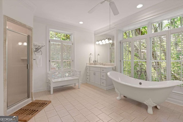 bathroom with vanity, tile patterned floors, ceiling fan, ornamental molding, and shower with separate bathtub