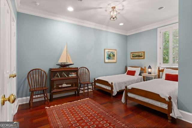 bedroom with dark hardwood / wood-style floors, crown molding, and a chandelier