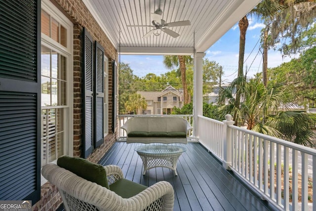 deck featuring ceiling fan and covered porch