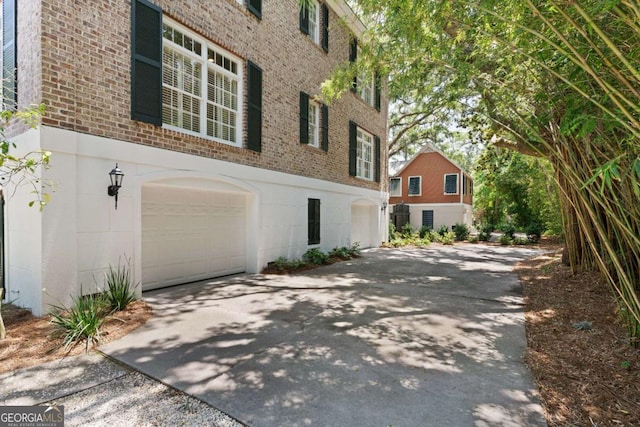 view of home's exterior featuring a garage