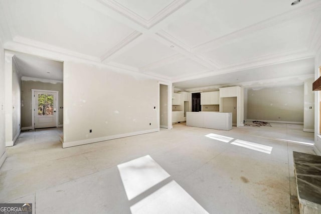 unfurnished living room with beam ceiling and coffered ceiling