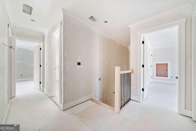 hallway featuring ornamental molding