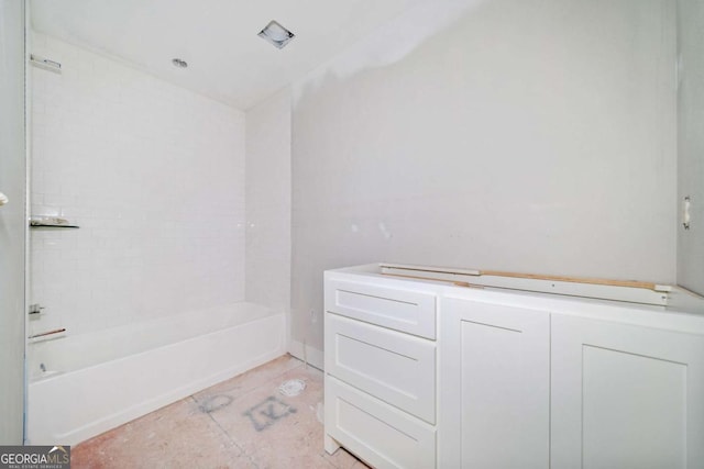 bathroom with shower / washtub combination