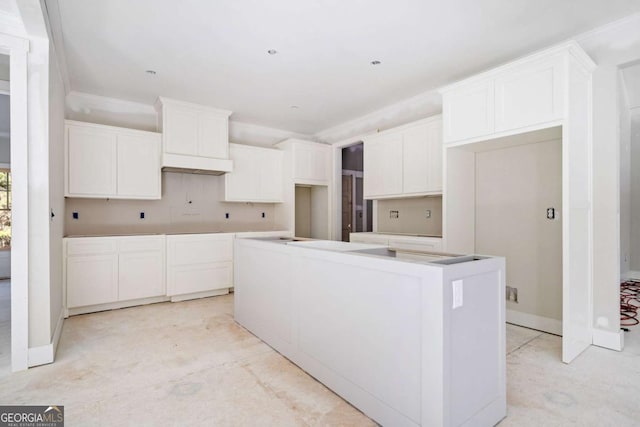 kitchen featuring white cabinetry and a kitchen island