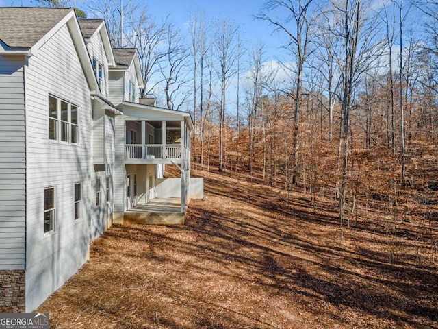 view of yard with a sunroom