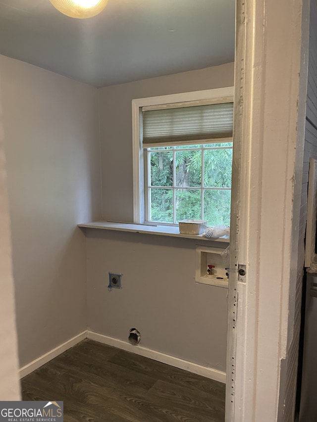 laundry area featuring hookup for an electric dryer, dark wood-type flooring, and washer hookup