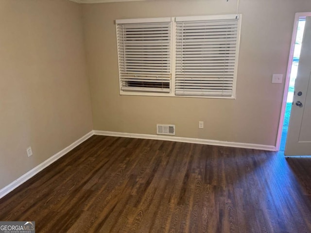 entryway with dark hardwood / wood-style floors