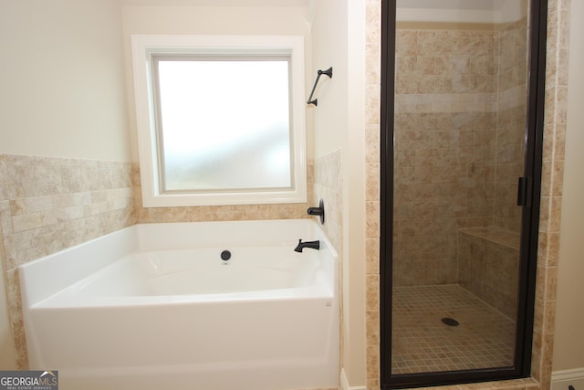 bathroom with independent shower and bath