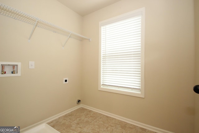 laundry room with hookup for a washing machine and hookup for an electric dryer