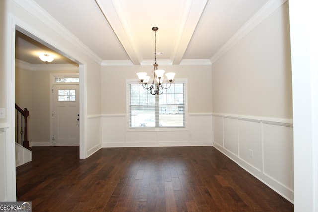 unfurnished dining area with a chandelier, ornamental molding, dark hardwood / wood-style flooring, and a healthy amount of sunlight