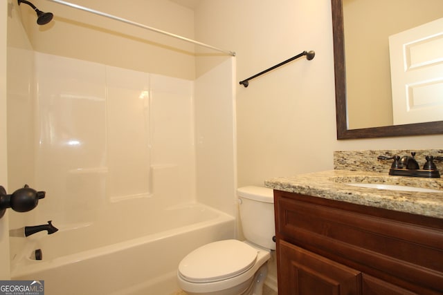 full bathroom with vanity, bathtub / shower combination, and toilet