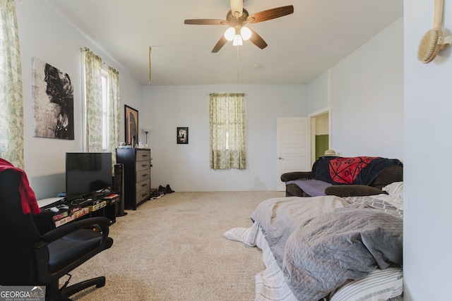 interior space with ceiling fan