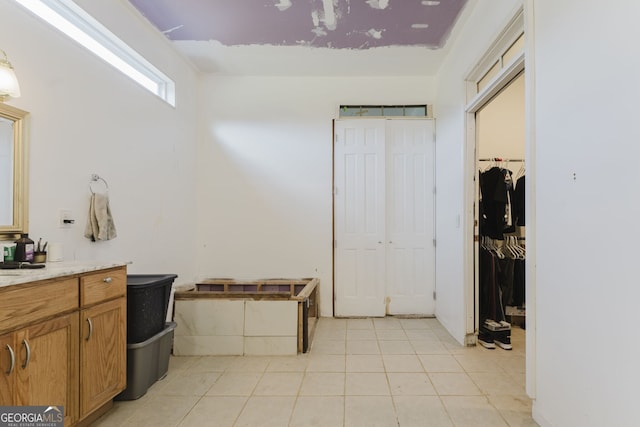 bathroom with tile patterned flooring