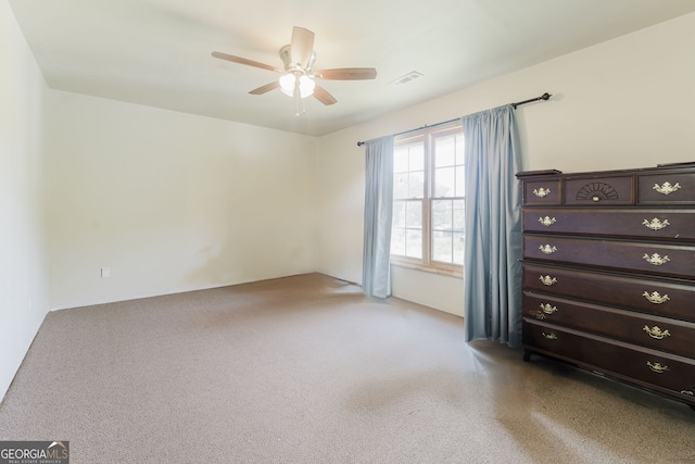 unfurnished room featuring ceiling fan