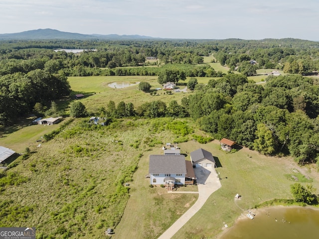 bird's eye view featuring a water and mountain view