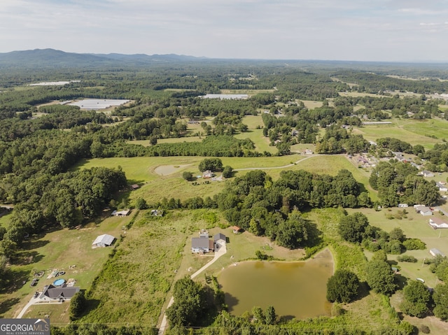 bird's eye view with a water and mountain view