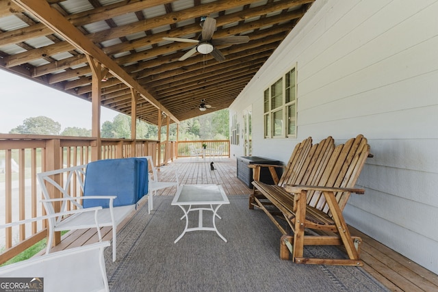 view of patio / terrace featuring ceiling fan and a deck