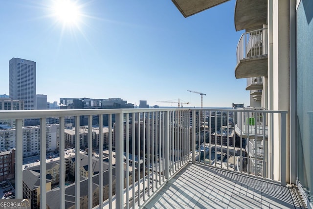 balcony featuring a view of city