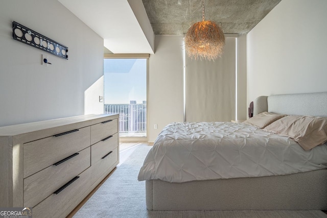 bedroom with light colored carpet