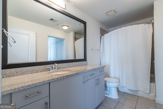 full bathroom featuring toilet, tile patterned flooring, shower / bathtub combination with curtain, and vanity