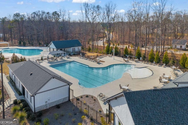 view of swimming pool featuring a patio