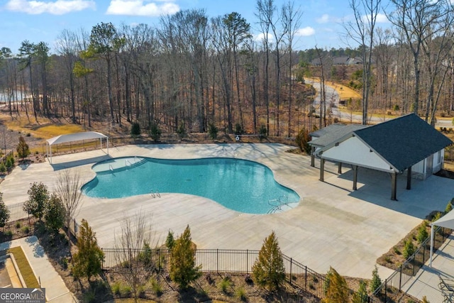 view of swimming pool featuring a patio