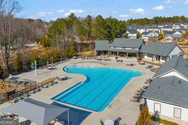 view of swimming pool featuring a patio