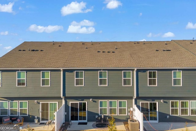 back of property featuring a patio area and central air condition unit