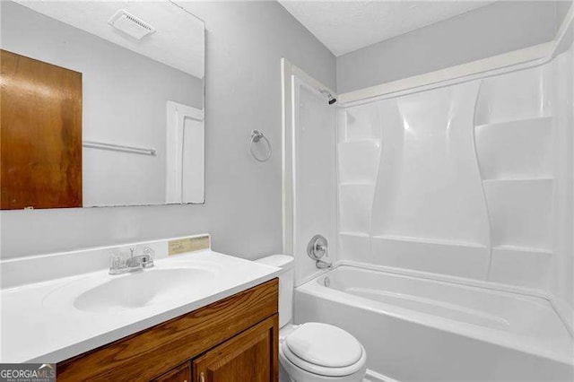 full bathroom featuring vanity, toilet, and tub / shower combination