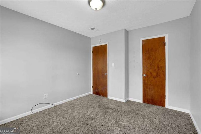 view of carpeted spare room