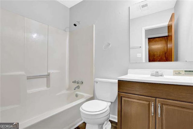 full bathroom featuring vanity,  shower combination, and toilet