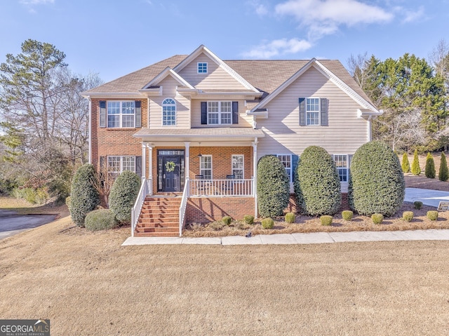 view of front of property featuring covered porch