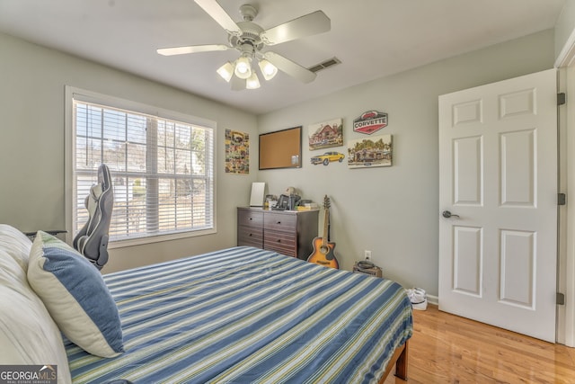 bedroom featuring ceiling fan and light wood-type flooring