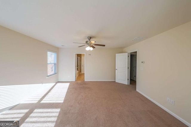 unfurnished room with light carpet and ceiling fan