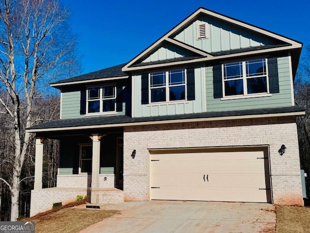 craftsman house featuring a porch and a garage