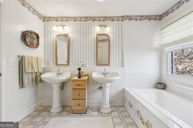 301 Benson Rd, Dallas, GA 30132 - bathroom featuring a bathtub