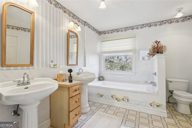 301 Benson Rd, Dallas, GA 30132 - bathroom with a tub to relax in and toilet