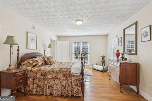 301 Benson Rd, Dallas, GA 30132 - bedroom with light hardwood / wood-style floors