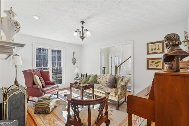 301 Benson Rd, Dallas, GA 30132 - sitting room with a textured ceiling and a chandelier