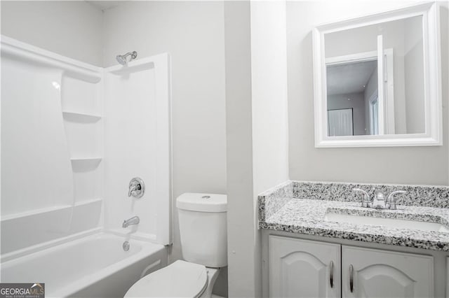 full bathroom with shower / bathtub combination, vanity, and toilet