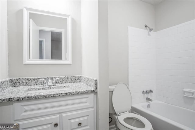 full bathroom with vanity, shower / washtub combination, and toilet