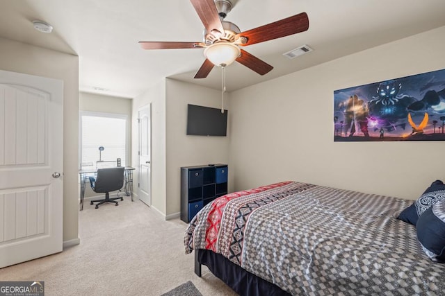 carpeted bedroom featuring ceiling fan